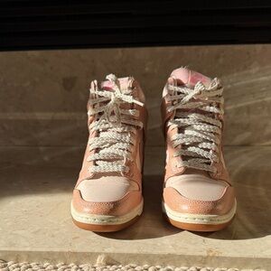 Nike Dunk Sky High hidden wedge blush pink and pale pink sneaker